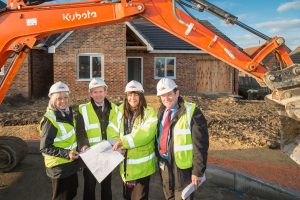 (L-R) Cllr Barbara Armstrong; Keith Tallintire, Director of Resources with Derwentside Homes; Moya Jones, Development Director with Prince Bishops Homes and Cllr Joe Armstrong; view the plans at The Heathers, Hamsteels.