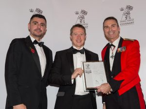 Former RAF Corporal and px employee Adran Corney, who works as Deputy Shift Team Leader, at the Teesside Gas Processing Plant and David Henderson, Group Development Director with px, collect the Silver Award from Major General Ranald Munro, Acting Chief of the Defence Staff (Reserves & Cadets).